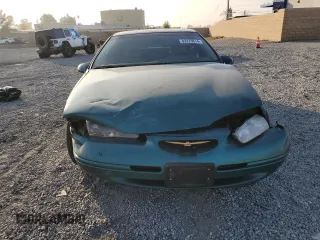1997 Ford Thunderbird LX with VIN 1FALP62W4VH170423, listed as a Copart auction lot 83379614 with 93,117 mi miles and Salvage Title. Bid and sale history available at DreamBid. Image 5.