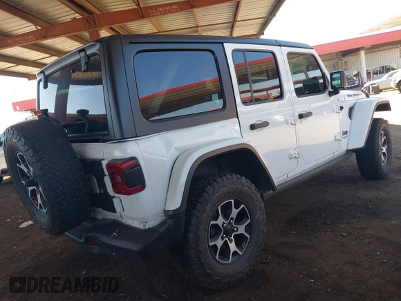2020 Jeep Wrangler Unlimited Rubicon with VIN 1C4HJXFGXLW107958, listed as a IAAI auction lot 42058477 with 69,951 mi miles and . Bid and sale history available at DreamBid. Image 4.