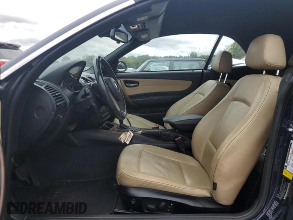 2009 BMW 1 Series 128i with VIN WBAUN13559VH80948, listed as a Copart auction lot 73012384 with 130,694 mi miles and Clean Title. Bid and sale history available at carsss.com. Image 7.