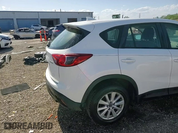 2016 Mazda CX-5 Sport с VIN JM3KE4BY1G0611368, выставлен на аукционе Copart как лот 56979385 с пробегом 106 397 миль миль и Списание • Salvage title. История ставок и продаж доступна на DreamBid. Изображение 14.