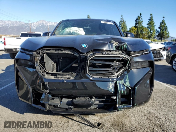 2023 BMW XM z VIN 5YM23CS08P9R97700, wystawiony jako Copart lot #79049744 z przebiegiem Nie podano mil oraz Szkody całkowita. Historia ofert i sprzedaży dostępna na DreamBid. Obrazek 5.