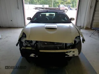 2002 Ford Thunderbird Hardtop Premium z VIN 1FAHP60A52Y130277, wystawiony jako Copart lot #69473594 z przebiegiem Nie podano mil oraz Szkoda całkowita • Salvage title. Historia ofert i sprzedaży dostępna na DreamBid. Obrazek 5.
