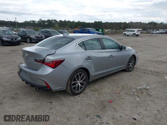 2020 Acura ILX w/Premium Pkg with VIN 19UDE2F74LA004006, listed as a IAAI auction lot 41814699 with 73,279 mi miles. Bid and sale history available at carsss.com. Image 4.