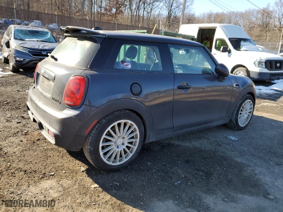 2014 MINI Cooper Hardtop S with VIN WMWXM7C54ET970410, listed as a Copart auction lot 87269984 with NaN miles and Salvage Title. Bid and sale history available at carsss.com. Image 3.
