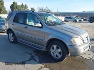 2005 Mercedes-Benz M-Class 3.7L with VIN 4JGAB57E75A525969, listed as a IAAI auction lot 41839065 with 191,601 mi miles. Bid and sale history available at carsss.com. Image 1.