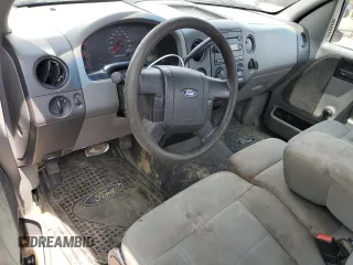 2007 Ford F-150 XL with VIN 1FTRF122X7NA00997, listed as a Copart auction lot 59664585 with 295,172 mi miles and Salvage title. Bid and sale history available at DreamBid. Image 8.
