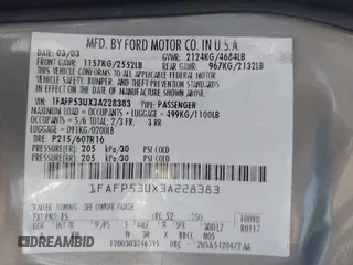2003 Ford Taurus SE Standard z VIN 1FAFP53UX3A228383, wystawiony jako IAAI lot #42700752 z przebiegiem 182 598 mil mil oraz . Historia ofert i sprzedaży dostępna na DreamBid. Obrazek 9.