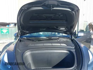 2025 Tesla Model Y Long Range with VIN 7SAYGDED0SF256230, listed as a IAAI auction lot 41356520 with 262 mi miles and . Bid and sale history available at DreamBid. Image 10.