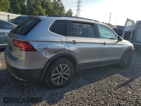 2021 Volkswagen Tiguan S with VIN 3VV1B7AX9MM023655, listed as a Copart auction lot 64159445 with 55,795 mi miles and Salvage title. Bid and sale history available at DreamBid. Image 3.