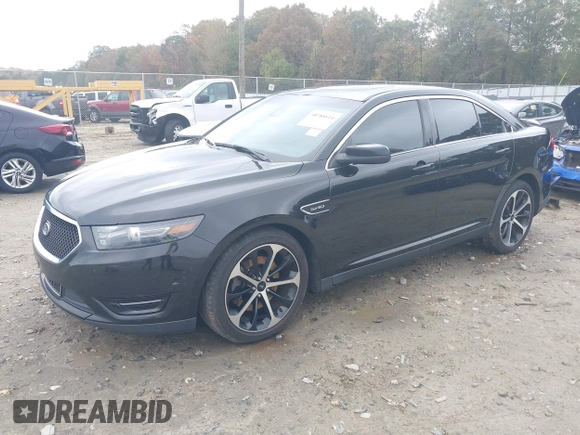 2015 Ford Taurus SHO with VIN 1FAHP2KT7FG148444, listed as a IAAI auction lot 40788614 with 121,533 mi miles and . Bid and sale history available at DreamBid. Image 18.