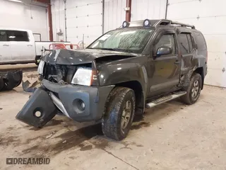 2013 Nissan Xterra Pro-4X with VIN 5N1AN0NW8DN816364, listed as a IAAI auction lot 41680564 with 197,768 mi miles. Bid and sale history available at carsss.com. Image 2.
