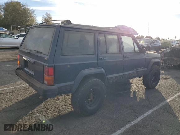 1996 Jeep Cherokee Sport with VIN 1J4FT68S4TL333342, listed as a Copart auction lot 41664965 with 185,199 mi miles and Clean Title. Bid and sale history available at carsss.com. Image 3.