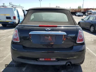 2015 MINI Convertible with VIN WMWZN3C56FT266838, listed as a Copart auction lot 50250745 with 60,331 mi miles and Salvage title. Bid and sale history available at DreamBid. Image 6.