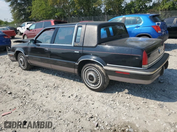 1992 Chrysler New Yorker z VIN 1C3XV66R2ND759195, wystawiony jako Copart lot #69650044 z przebiegiem 70 387 mil mil oraz Szkoda całkowita • Salvage title. Historia ofert i sprzedaży dostępna na DreamBid. Obrazek 2.