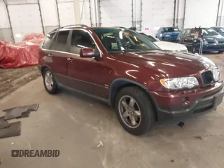2001 BMW X5 4.4i with VIN WBAFB33561LH24532, listed as a IAAI auction lot 41611503 with 188,671 mi miles. Bid and sale history available at carsss.com. Image 1.