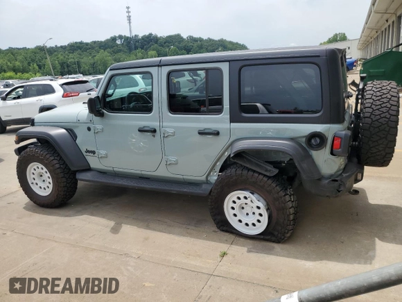 2023 Jeep Wrangler Sport with VIN 1C4HJXDN0PW643485, listed as a Copart auction lot 59783564 with 14,001 mi miles and Salvage Title. Bid and sale history available at DreamBid. Image 2.