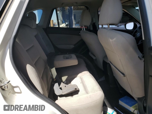 2015 Mazda CX-5 Touring with VIN JM3KE2CY2F0478167, listed as a Copart auction lot 52772805 with 135,492 mi miles and Salvage Title. Bid and sale history available at carsss.com. Image 11.