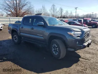 2023 Toyota Tacoma 4WD SR with VIN 3TMCZ5AN5PM552045, listed as a Copart auction lot 46682005 with 20,023 mi miles and Salvage Title. Bid and sale history available at carsss.com. Image 4.