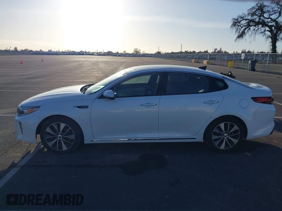 2016 Kia Optima SXL Turbo with VIN 5XXGV4L20GG023095, listed as a IAAI auction lot 41580598 with 155,002 mi miles. Bid and sale history available at carsss.com. Image 14.