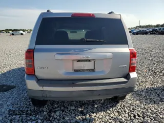 2014 Jeep Patriot Latitude with VIN 1C4NJRFB9ED759908, listed as a Copart auction lot 63874905 with 61,960 mi miles and Salvage title. Bid and sale history available at DreamBid. Image 6.