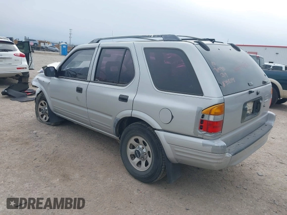 1999 Isuzu Rodeo S with VIN 4S2CK58W4X4358898, listed as a IAAI auction lot 41360738 with 184,948 mi miles and . Bid and sale history available at carsss.com. Image 3.