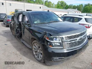 2016 Chevrolet Tahoe LT z VIN 1GNSKBKC7GR331631, wystawiony jako IAAI lot #42300624 z przebiegiem 73 126 mil mil oraz . Historia ofert i sprzedaży dostępna na DreamBid. Obrazek 1.