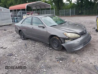 2006 Toyota Camry STD with VIN 4T1BE30K46U693147, listed as a IAAI auction lot 42601821 with 302,528 mi miles and . Bid and sale history available at DreamBid. Image 1.