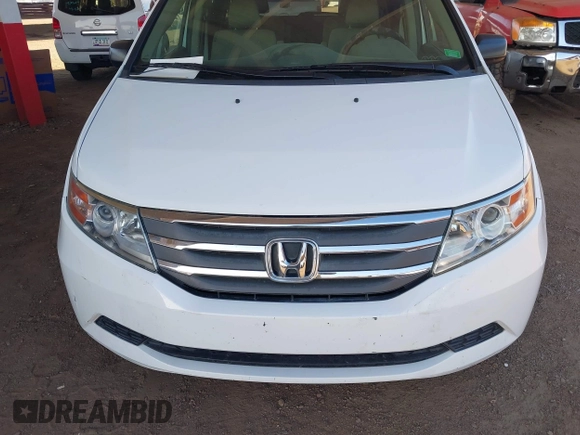 2013 Honda Odyssey LX with VIN 5FNRL5H2XDB028879, listed as a IAAI auction lot 41958988 with 49,868 mi miles and . Bid and sale history available at carsss.com. Image 6.