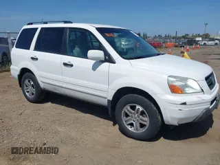 2004 Honda Pilot EX with VIN 2HKYF18514H614300, listed as a IAAI auction lot 42044675 with 251,963 mi miles and . Bid and sale history available at DreamBid. Image 1.