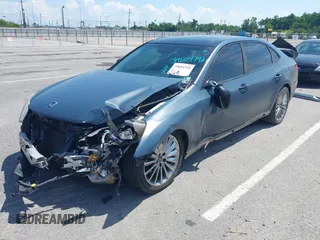 2014 Hyundai Equus Signature with VIN KMHGH4JH4EU082362, listed as a IAAI auction lot 40009982 with 104,388 mi miles and . Bid and sale history available at DreamBid. Image 2.