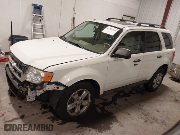 2012 Ford Escape XLT z VIN 1FMCU9DG4CKA72675, wystawiony jako IAAI lot #41212739 z przebiegiem 112 781 mil mil oraz . Historia ofert i sprzedaży dostępna na DreamBid. Obrazek 19.