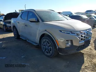 2023 Hyundai Santa Cruz SEL z VIN 5NTJCDAE0PH067631, wystawiony jako IAAI lot #41417234 z przebiegiem 31 090 mil mil oraz . Historia ofert i sprzedaży dostępna na DreamBid. Obrazek 1.