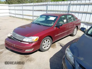 2001 Toyota Avalon XL z VIN 4T1BF28B41U178086, wystawiony jako IAAI lot #42253446 z przebiegiem 249 390 mil mil oraz . Historia ofert i sprzedaży dostępna na DreamBid. Obrazek 2.