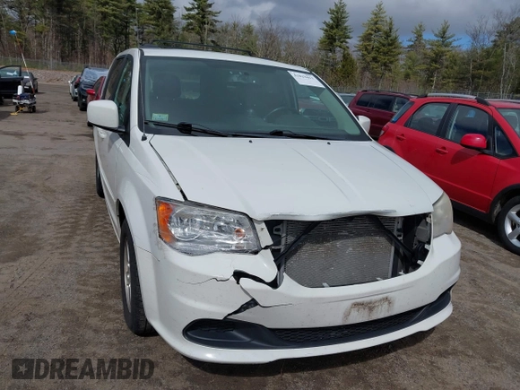 2012 Dodge Grand Caravan SXT with VIN 2C4RDGCGXCR248859, listed as a IAAI auction lot 41829411 with 111,515 mi miles and . Bid and sale history available at DreamBid. Image 12.