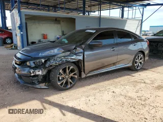 2021 Honda Civic Sport with VIN 19XFC2F80ME003634, listed as a Copart auction lot 52317715 with 69,411 mi miles and Salvage Title. Bid and sale history available at DreamBid. Image 1.