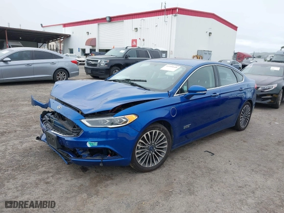 2017 Ford Fusion Energi Titanium with VIN 3FA6P0SU5HR229670, listed as a IAAI auction lot 41594048 with 117,848 mi miles. Bid and sale history available at carsss.com. Image 17.
