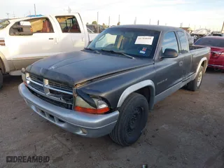 2002 Dodge Dakota SLT with VIN 1B7GL42X42S682184, listed as a IAAI auction lot 41784688 with 168,298 mi miles. Bid and sale history available at carsss.com. Image 2.