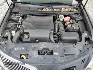 2014 Lincoln MKS EcoBoost z VIN 1LNHL9FT5EG601141, wystawiony jako Copart lot #86497854 z przebiegiem 136 915 mil mil oraz Szkoda całkowita • Salvage title. Historia ofert i sprzedaży dostępna na DreamBid. Obrazek 11.