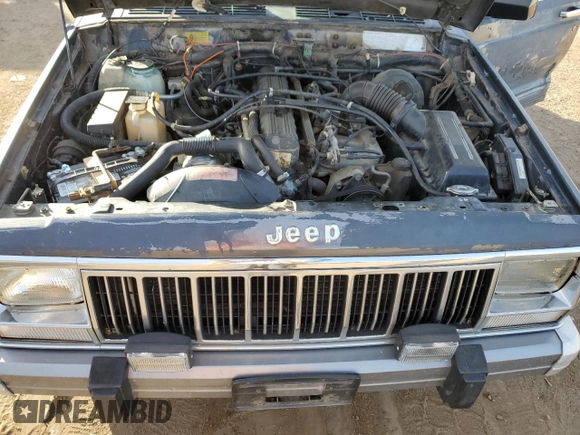 1992 Jeep Cherokee with VIN 1J4FJ58S7NL136135, listed as a Copart auction lot 86016134 with 160,259 mi miles and Clean title. Bid and sale history available at DreamBid. Image 12.