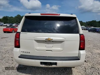 2015 Chevrolet Tahoe LT z VIN 1GNSCBKC5FR638002, wystawiony jako Copart lot #54857225 z przebiegiem 142 165 mil mil oraz Szkoda całkowita • Salvage title. Historia ofert i sprzedaży dostępna na DreamBid. Obrazek 6.