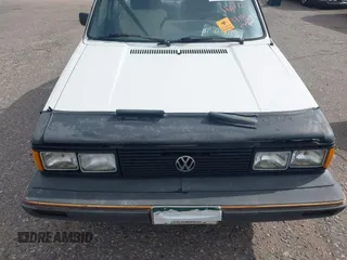 1982 Volkswagen Jetta z VIN WVWGA9161CW521961, wystawiony jako IAAI lot #42373314 z przebiegiem 52 051 mil mil oraz . Historia ofert i sprzedaży dostępna na DreamBid. Obrazek 6.