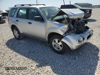 2011 Ford Escape XLS с VIN 1FMCU0C70BKB97667, выставлен на аукционе Copart как лот 52709365 с пробегом 140 582 миль миль и Списание • Salvage title. История ставок и продаж доступна на DreamBid. Изображение 4.
