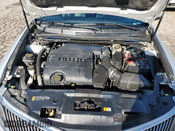 2014 Lincoln MKS with VIN 1LNHL9EK5EG606901, listed as a Copart auction lot 75300803 with 98,694 mi miles and Clean Title. Bid and sale history available at DreamBid. Image 12.