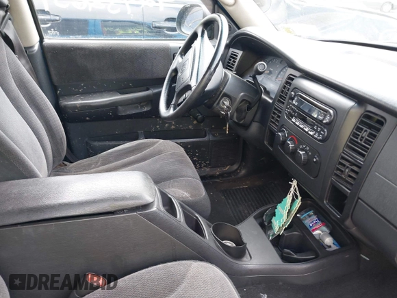 2001 Dodge Dakota Sport z VIN 1B7GL2AN31S115001, wystawiony jako IAAI lot #42452634 z przebiegiem Nie podano mil oraz . Historia ofert i sprzedaży dostępna na DreamBid. Obrazek 5.