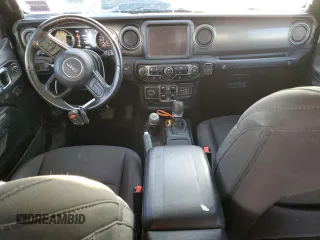 2023 Jeep Wrangler Willys with VIN 1C4HJXDG1PW527567, listed as a Copart auction lot 42218255 with 43,273 mi miles and Salvage Title. Bid and sale history available at DreamBid. Image 8.