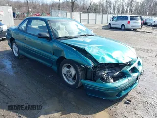 1997 Pontiac Grand Am z VIN 1G2NW12T8VC715717, wystawiony jako IAAI lot #41533544 z przebiegiem 82 805 mil mil oraz . Historia ofert i sprzedaży dostępna na DreamBid. Obrazek 1.