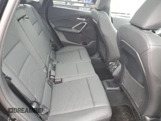 2023 BMW X1 xDrive28i with VIN WBX73EF09P5W64467, listed as a Copart auction lot 58586875 with 29,022 mi miles and Salvage title. Bid and sale history available at DreamBid. Image 11.