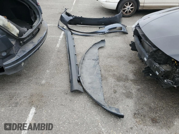 2014 Tesla Model S 60 with VIN 5YJSA1S14EFP56277, listed as a Copart auction lot 57162685 with Not provided miles and Salvage title. Bid and sale history available at DreamBid. Image 12.