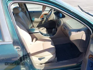 1999 Mercury Sable LS z VIN 1MEFM53S7XA612899, wystawiony jako IAAI lot #41687188 z przebiegiem 155 128 mil mil oraz . Historia ofert i sprzedaży dostępna na DreamBid. Obrazek 5.