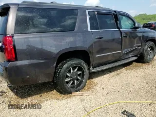 2016 Chevrolet Suburban LT z VIN 1GNSKHKC1GR198058, wystawiony jako Copart lot #56909335 z przebiegiem 150 907 mil mil oraz Szkoda całkowita • Salvage title. Historia ofert i sprzedaży dostępna na DreamBid. Obrazek 14.